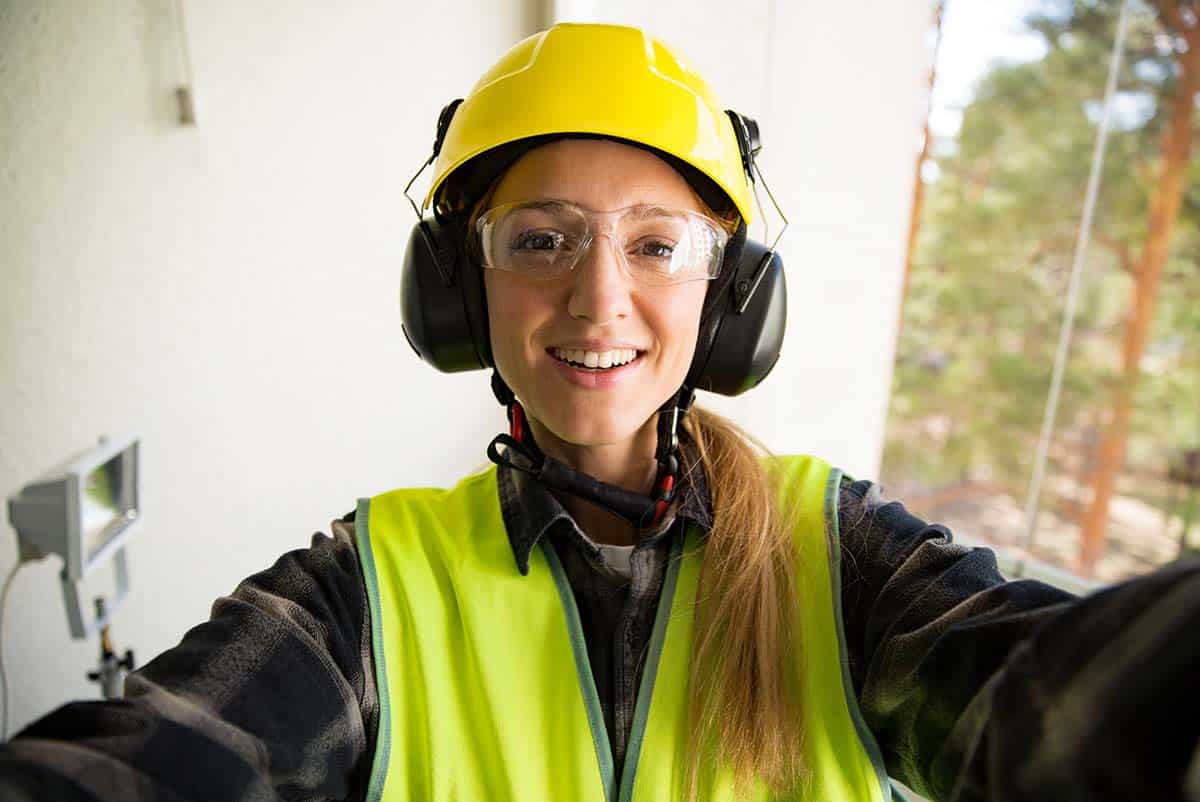 Worker taking a selfie after settling a claim with her Employment Lawyer in Pennsylvania