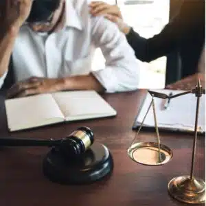 Image of upset defendant in a criminal court proceeding