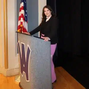 Photo of Attorney Kimberly Lennox at the podium speaking to students at Wyomissing Area Junior-Senior High School