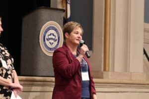 Photo of Hope Migliaccio speaking to students at Wyomissing Area Junior-Senior High School