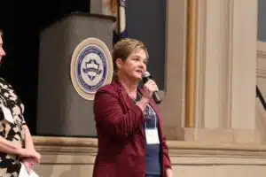 Photo of Hope Migliaccio speaking to students at Wyomissing Area Junior-Senior High School