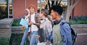 Photo of college students walking together on campus